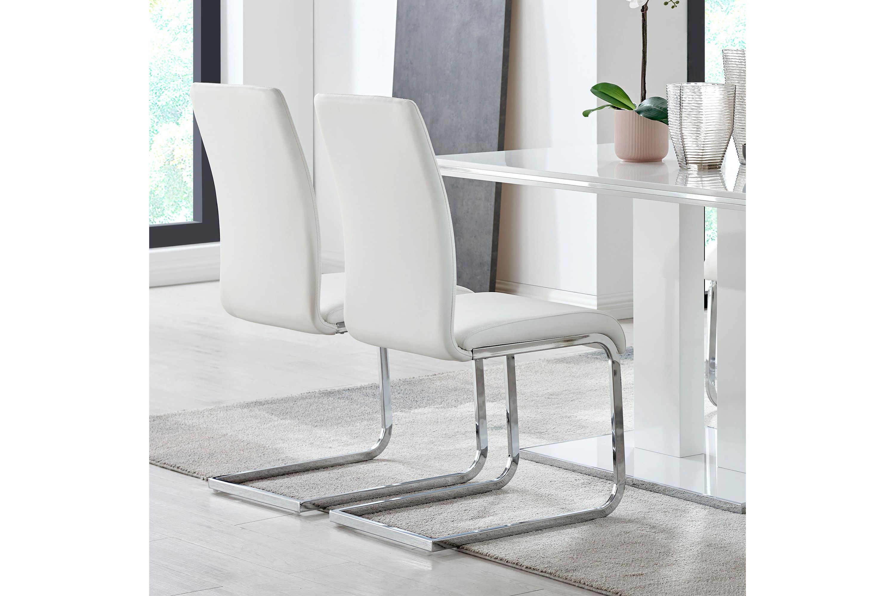Amanda Contemporary Side Chair in White Faux Leather and Chrome Finish - Set of 2