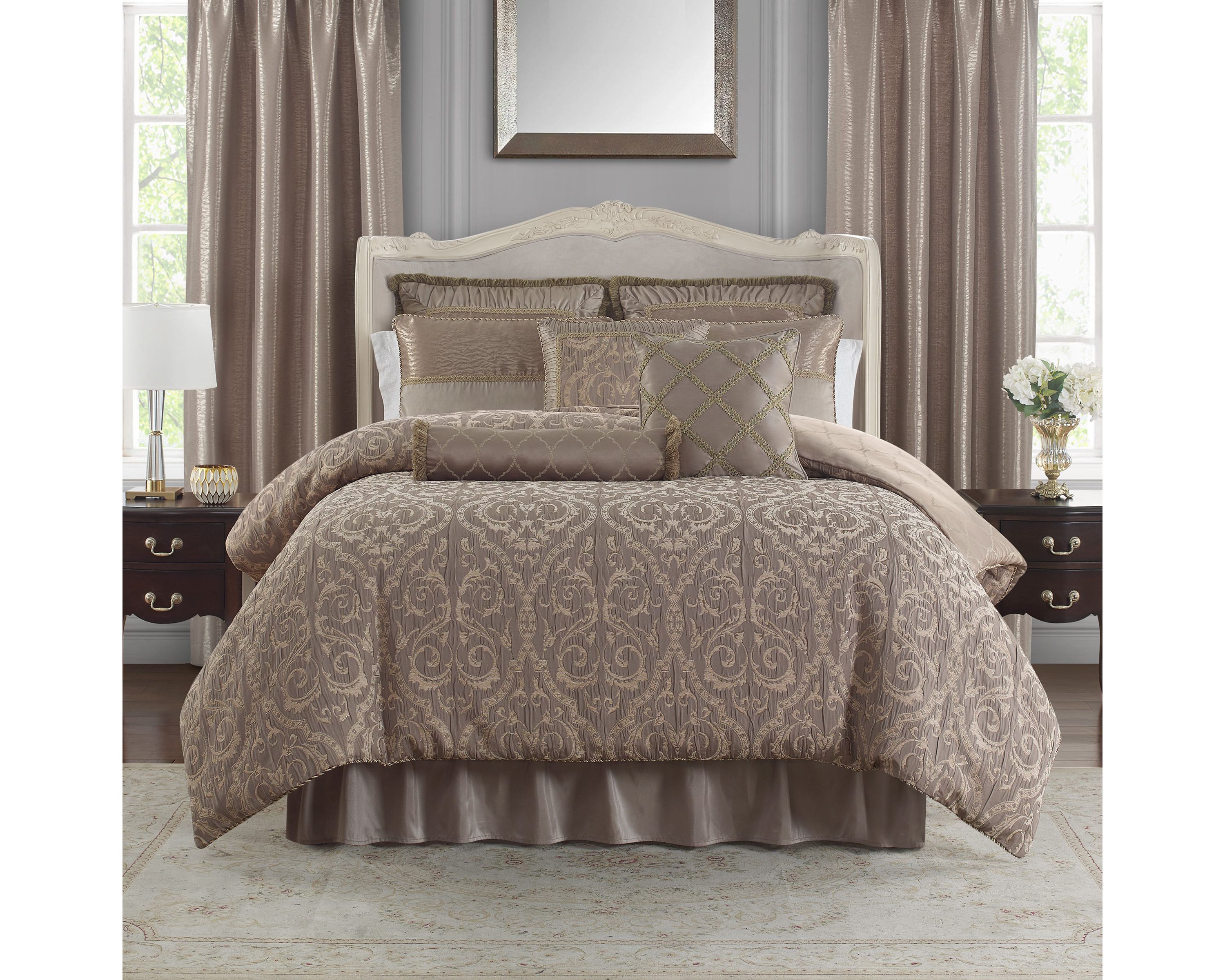 The rich Waterford Fine Linens Hazeldene bedding set is a beautiful allover taupe design. The woven jacquard comforter has a pucker construction creating exquisite dimension. Coordinating pillow shams add shine and are finished with an elegant accent and corded trim.   Included in the set is a ruffled taupe bedskirt and textured euro shams with a ruched border and fringe accent reversing to an hourglass design.  Queen dimensions: Comforter 92" x 96", Std Sham 20" x 26",  European Sham 26" x 26" Bed Skirt 60" x 80" with 16" drop, King dimensions: Comforter 110" x 96", King Shams 20" x 36", European shams 26" x 26" and Bed Skirt 72" x 84" with 16" drop.  Dry Clean Only.