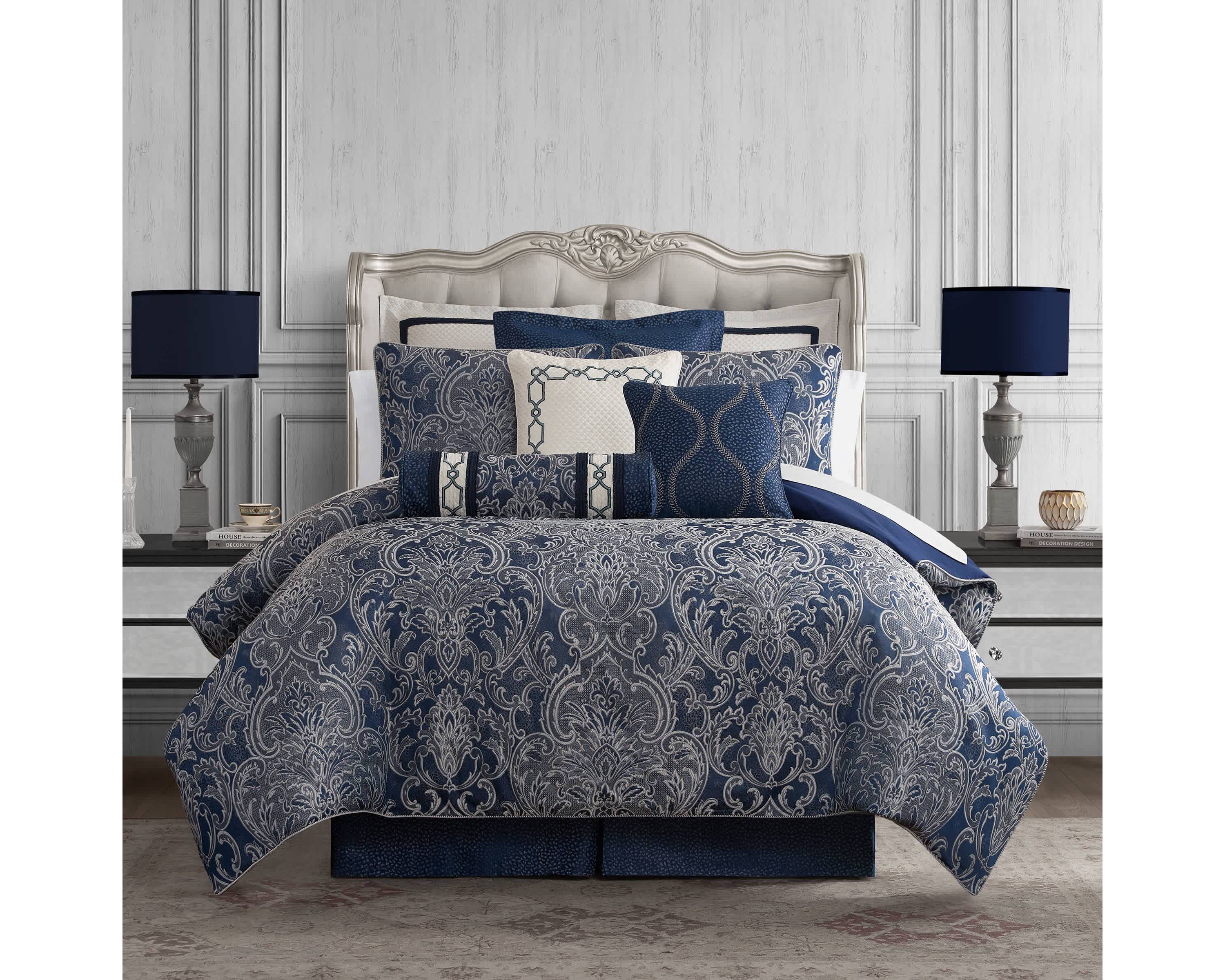 The elegant Waterford Blarney bedding set is an exquisite woven jacquard in blue with ivory accents.   The comforter and matching pillow shams feature a multi layer jacquard with a blooming arabesque design . Add a contemporary feel with the center pleat bedskirt in blue with a small pebble woven design. Included in the four piece set is the comforter, two pillow shams and bedskirt.