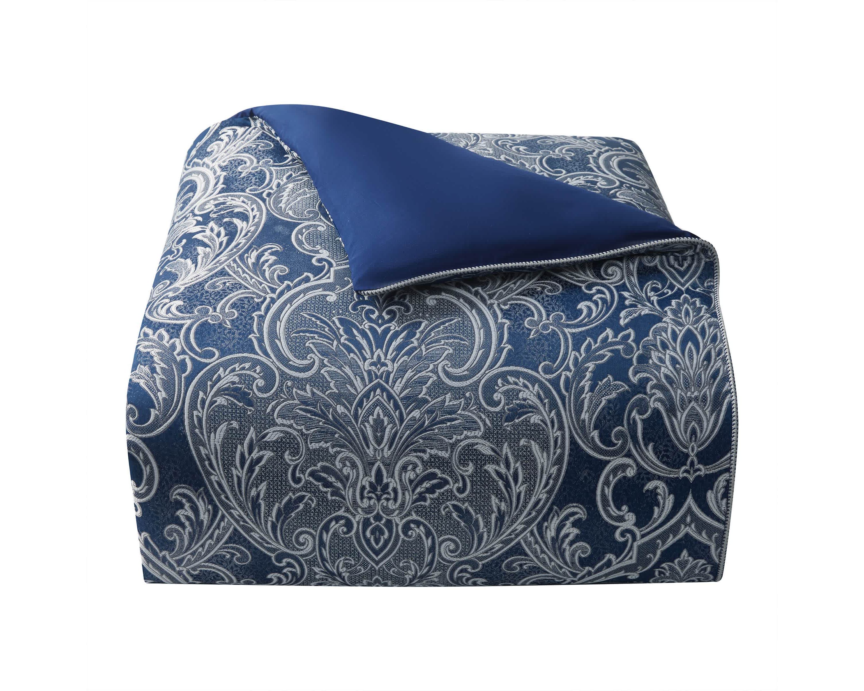 The elegant Waterford Blarney bedding set is an exquisite woven jacquard in blue with ivory accents.   The comforter and matching pillow shams feature a multi layer jacquard with a blooming arabesque design . Add a contemporary feel with the center pleat bedskirt in blue with a small pebble woven design. Included in the four piece set is the comforter, two pillow shams and bedskirt.