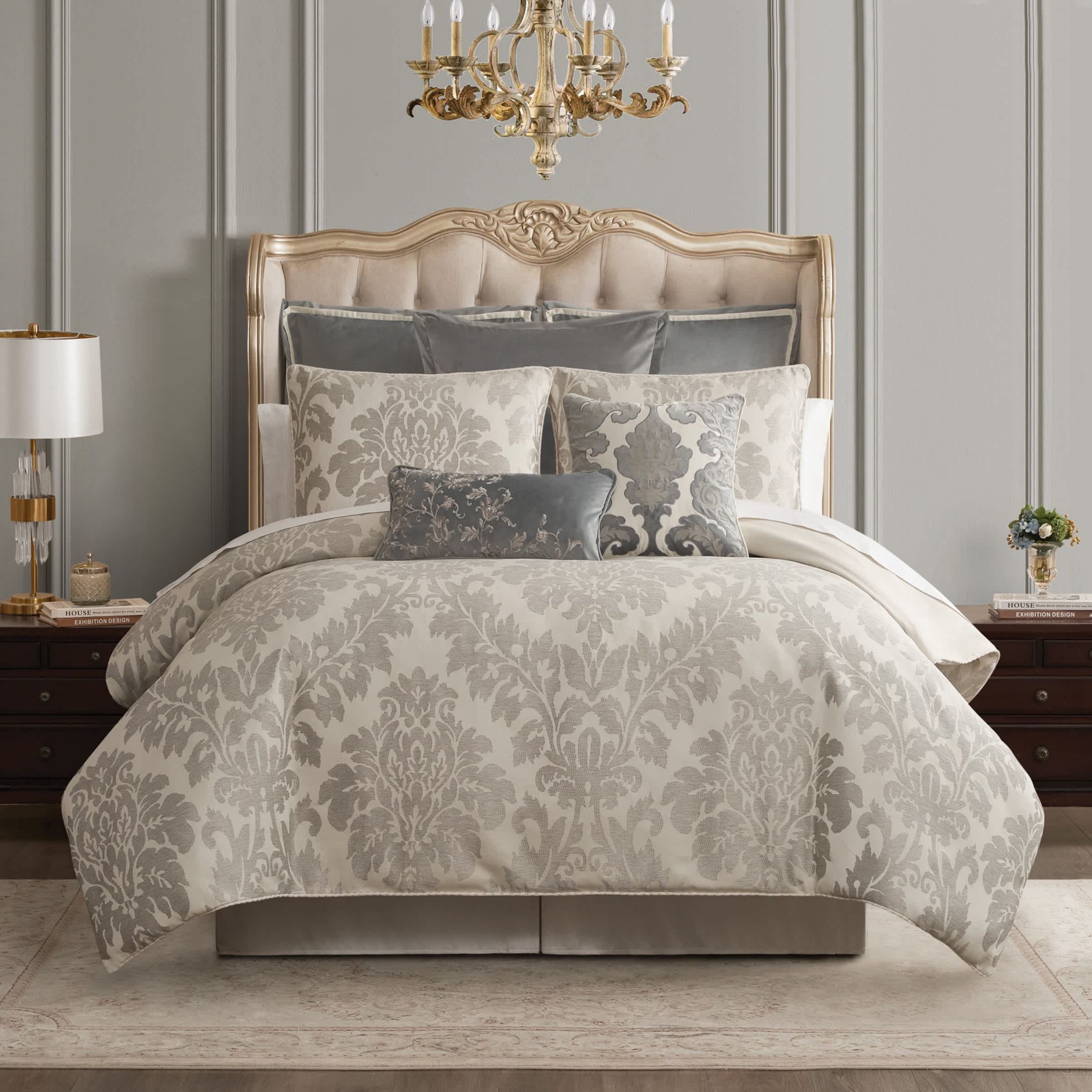 The large scale woven damask with an hourglass design provides a stunning update to your bedroom. The ivory and platinum four piece set includes a comforter with matching pillow shams and center pleat bedskirt.