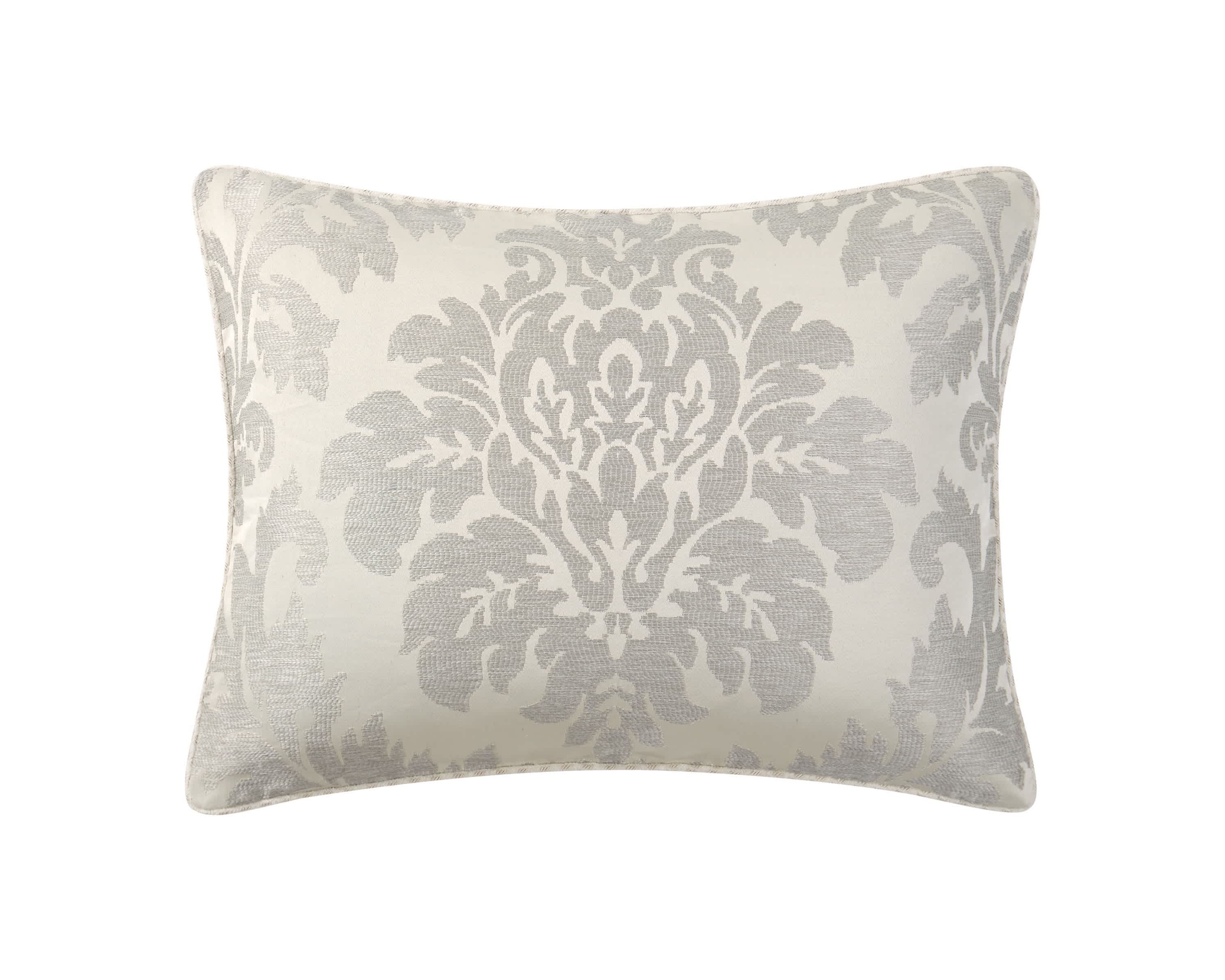 The large scale woven damask with an hourglass design provides a stunning update to your bedroom. The ivory and platinum four piece set includes a comforter with matching pillow shams and center pleat bedskirt.