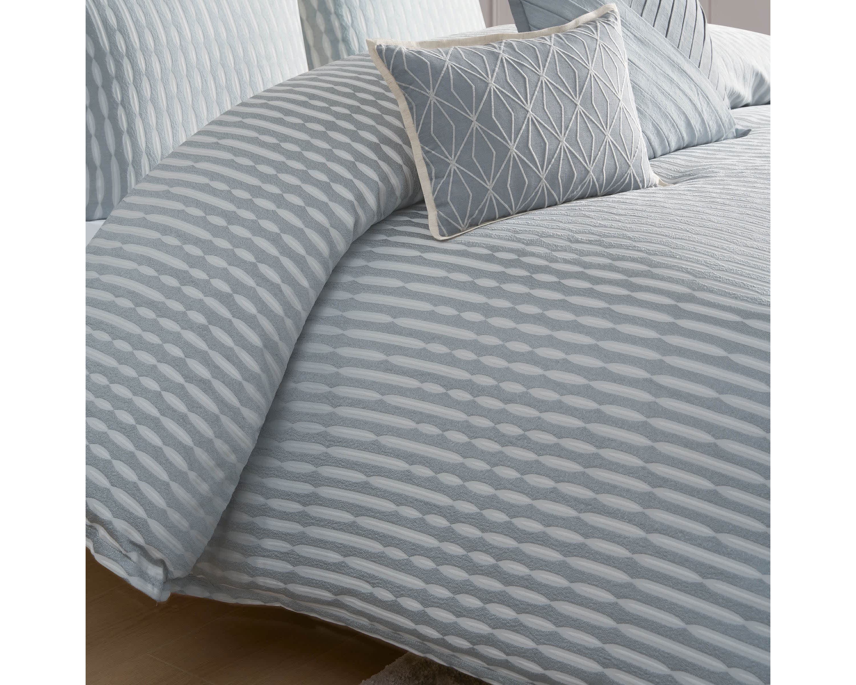 The Waterford Aretha Blue 3-Piece Comforter Set is the epitome of refined luxury, designed to bring a sense of serenity and sophistication to your bedroom. This elegant set includes a beautifully crafted comforter and two coordinating shams, all featuring a rich, soothing blue tone that complements a wide range of bedroom styles. The comforter’s intricate pattern, subtle  texture and depth, creates a timeless, opulent look that is both classic and contemporary. Expertly constructed from high-quality fabrics, this comforter set offers a soft, luxurious feel while providing exceptional warmth and comfort for a restful night’s sleep. The Waterford Aretha Blue Comforter Set is perfect for those seeking to add a touch of elegance to their master bedroom, guest room, or even a chic hotel-inspired retreat. Durable and easy to care for, this set is not only a stunning visual addition to your space but also a practical one. With its combination of craftsmanship, style, and comfort, the Waterford Aretha Blue 3-Piece Comforter Set offers lasting beauty and luxury for your home. Elevate your bedroom decor today with this exquisite set and indulge in the ultimate in sophisticated bedding.
