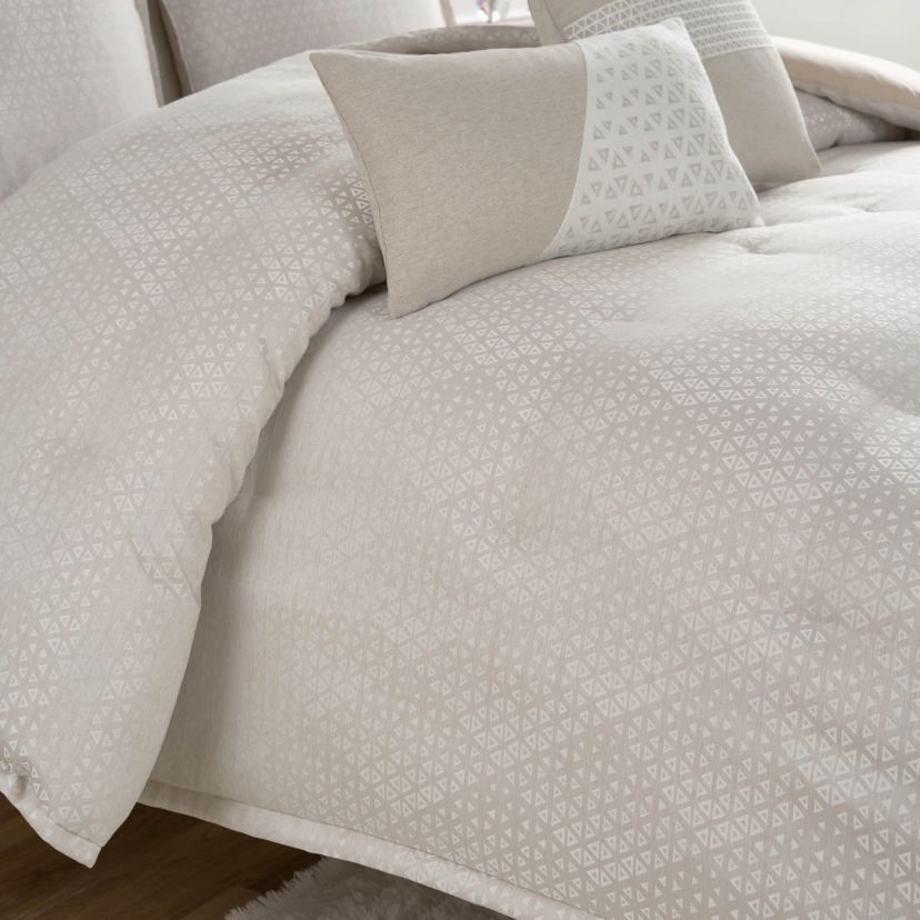The Waterford Lauryn Almond 3-Piece Comforter Set is a masterpiece of understated elegance, designed to bring warmth and sophistication to any bedroom. This luxurious set includes a beautifully crafted comforter and two coordinating shams, all in a soft, warm almond hue that exudes timeless charm and complements a wide range of interior styles. The subtle pattern enhances the set’s classic appeal, adding a touch of texture and depth that elevates your bedroom’s aesthetic. Made from high-quality materials, the Waterford Lauryn Almond Comforter Set provides exceptional comfort and warmth, offering a restful night’s sleep wrapped in softness. Its refined color and plush construction make it the ideal choice for a master suite, guest room, or any space in need of a touch of sophisticated luxury. Durable and easy to care for, this 3-piece set seamlessly blends beauty and practicality. The Waterford Lauryn Almond 3-Piece Comforter Set transforms your bedroom into a serene retreat, bringing lasting elegance and comfort to your home.