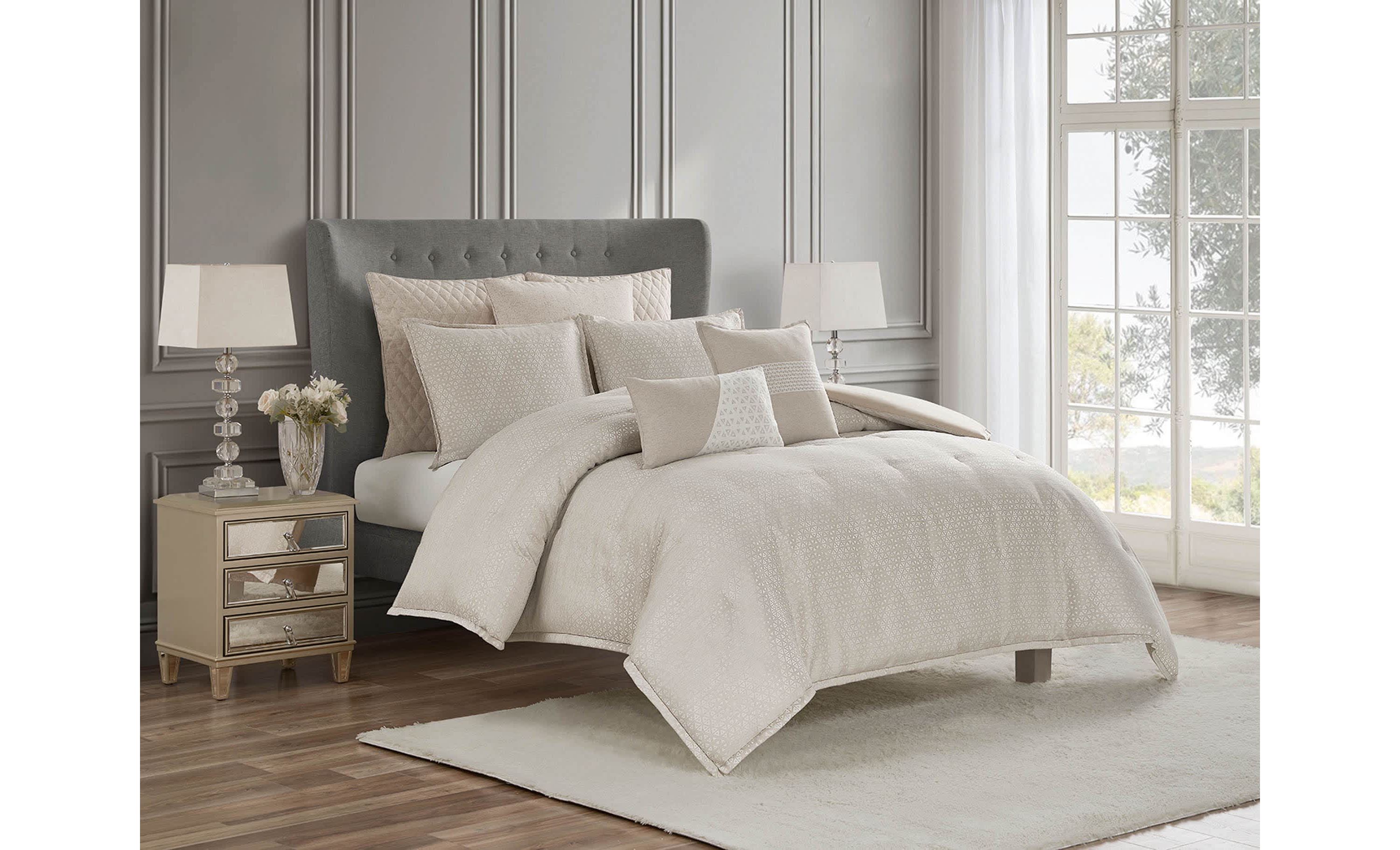 The Waterford Lauryn Almond 3-Piece Comforter Set is a masterpiece of understated elegance, designed to bring warmth and sophistication to any bedroom. This luxurious set includes a beautifully crafted comforter and two coordinating shams, all in a soft, warm almond hue that exudes timeless charm and complements a wide range of interior styles. The subtle pattern enhances the set’s classic appeal, adding a touch of texture and depth that elevates your bedroom’s aesthetic. Made from high-quality materials, the Waterford Lauryn Almond Comforter Set provides exceptional comfort and warmth, offering a restful night’s sleep wrapped in softness. Its refined color and plush construction make it the ideal choice for a master suite, guest room, or any space in need of a touch of sophisticated luxury. Durable and easy to care for, this 3-piece set seamlessly blends beauty and practicality. The Waterford Lauryn Almond 3-Piece Comforter Set transforms your bedroom into a serene retreat, bringing lasting elegance and comfort to your home.