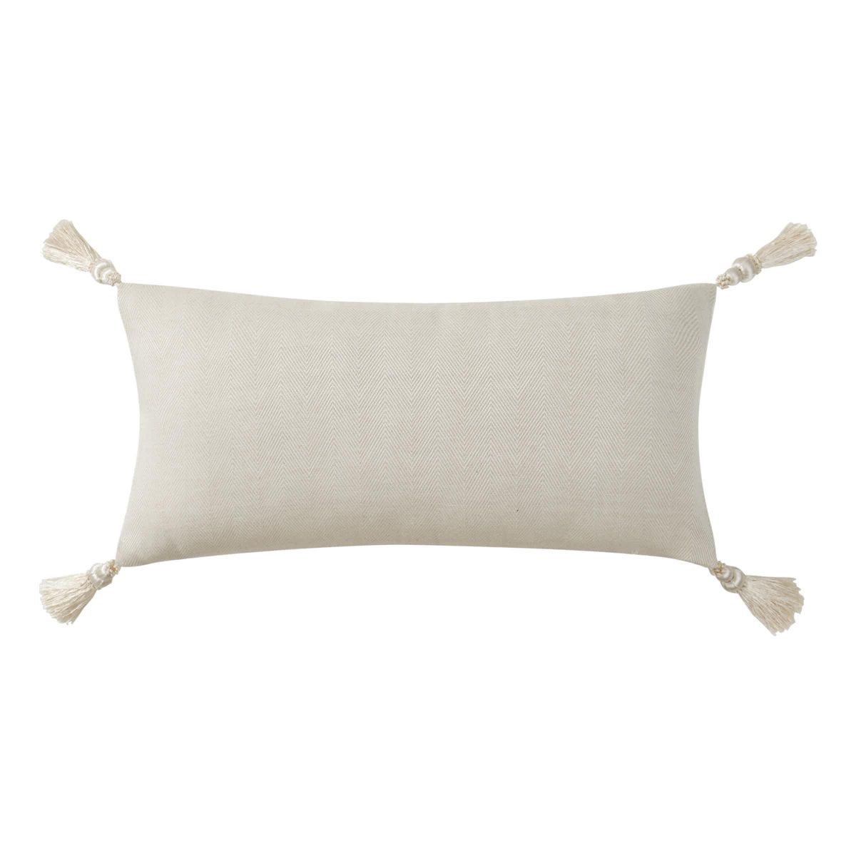 The ivory Arderra 11" x 22" exquisite decorative pillow features an embroidered leaf design. The pillow reverses to a herringbone pattern and is finished with four corner tassels.