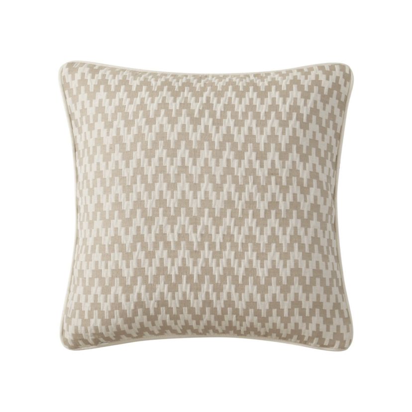 The Arderra 16" x 16" decorative pillow features a woven geometric design with a pleated pucker element and decorative trim. The pillow reverses to the woven geometric design and is finished with four sided self cording.