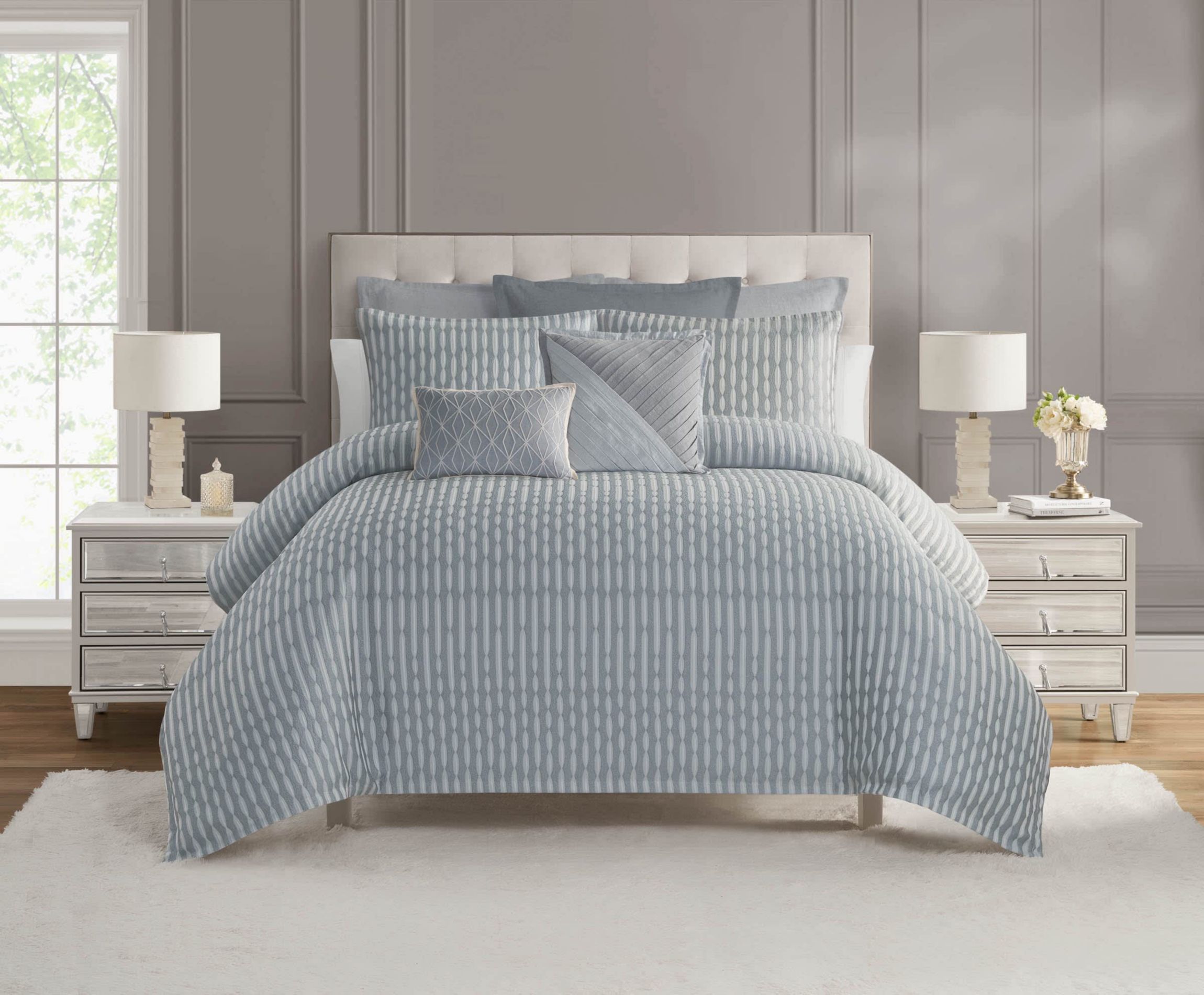 The Waterford Aretha Blue 18"x18" Decorative Pillow is the perfect finishing touch to your Aretha Blue Comforter Set, adding an extra layer of elegance and charm to your bed. Featuring the same intricate pattern as the comforter, this pillow enhances the luxurious feel of your space while introducing a pop of serene blue. The soft, plush texture of the pillow ensures comfort and style, while the rich blue hue complements the sophisticated look of your bedding. Whether placed at the center or flanked by other pillows, the Aretha Blue Decorative Pillow elevates the visual appeal of your bedroom, creating a serene and inviting atmosphere.