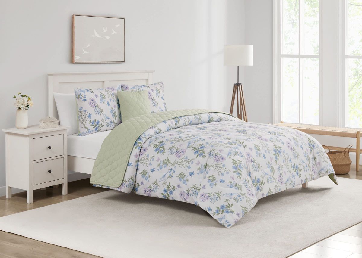 Transform your bedroom into a peaceful garden retreat with the Bird Garden Seafoam 5pc Comforter and Quilt Set. Featuring delicate watercolor blooms, fluttering butterflies, and soft bluebirds on silky microfiber, this set brings nature’s calm indoors. Reverses to a tranquil seafoam green for added serenity.