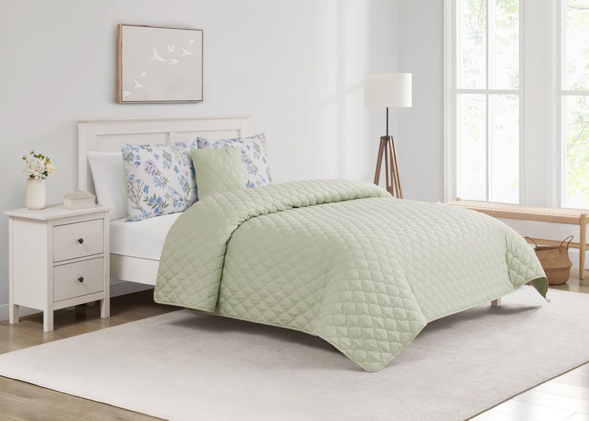 Transform your bedroom into a peaceful garden retreat with the Bird Garden Seafoam 5pc Comforter and Quilt Set. Featuring delicate watercolor blooms, fluttering butterflies, and soft bluebirds on silky microfiber, this set brings nature’s calm indoors. Reverses to a tranquil seafoam green for added serenity.