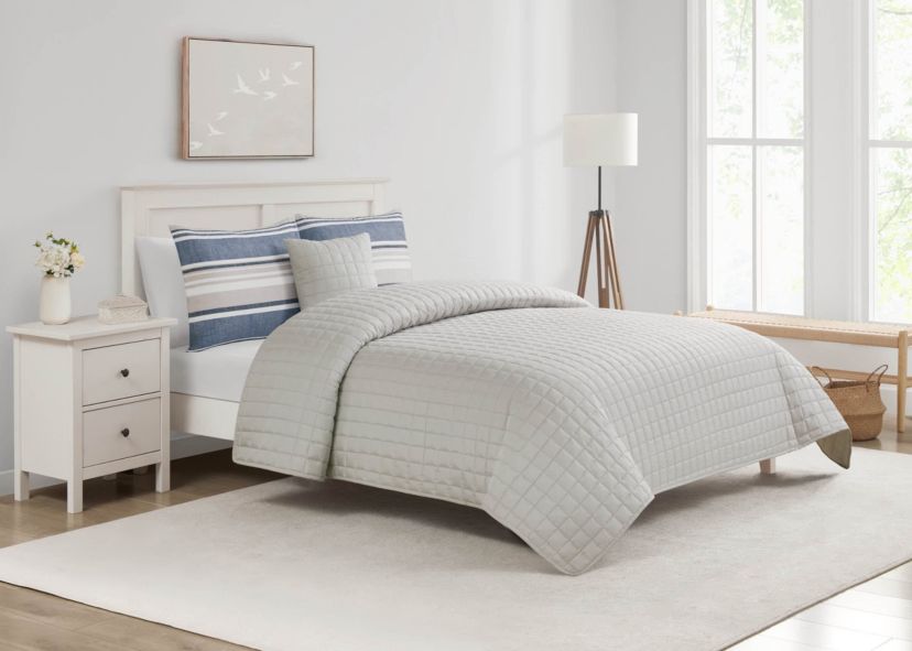 Refresh your space with the Easton Stripe 5pc Comforter and Quilt Set. Featuring classic stripes in blue, gray, and ivory, this set includes a cozy comforter, quilt, 2 shams, and a decorative pillow—perfect for effortless, layered style and year-round comfort.